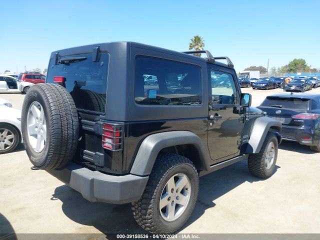 1C4AJWAG4EL157309 Jeep Wrangler Sport