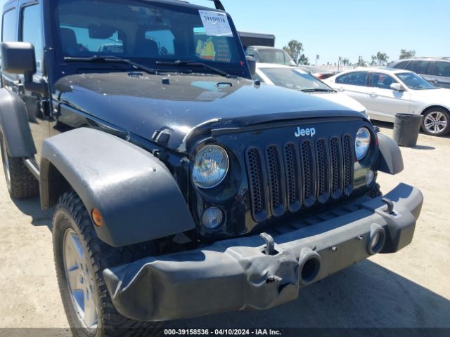 1C4AJWAG4EL157309 Jeep Wrangler Sport