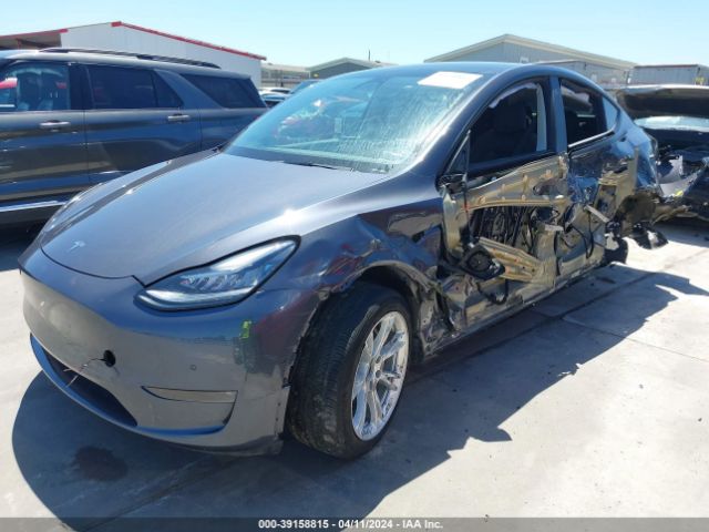 2022 TESLA MODEL Y 7SAYGDEE9NA003403 Photo 1