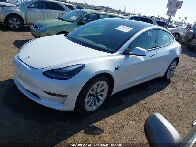 5YJ3E1EA4MF922011 Tesla Model 3 Standard Range Plus Rear-wheel Drive