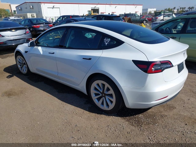 5YJ3E1EA4MF922011 Tesla Model 3 Standard Range Plus Rear-wheel Drive