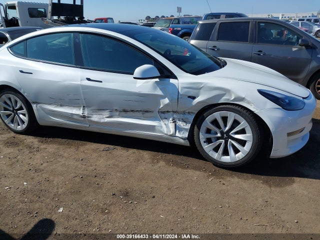 5YJ3E1EA4MF922011 Tesla Model 3 Standard Range Plus Rear-wheel Drive