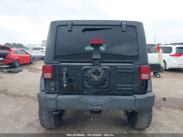 1C4HJWDG8EL190453 Jeep Wrangler Unlimited Sport