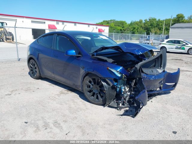 Продаж на аукціоні авто 2023 Tesla Model Y Awd/long Range Dual Motor All-wheel Drive, vin: 7SAYGAEE9PF769412, номер лоту: 39185244