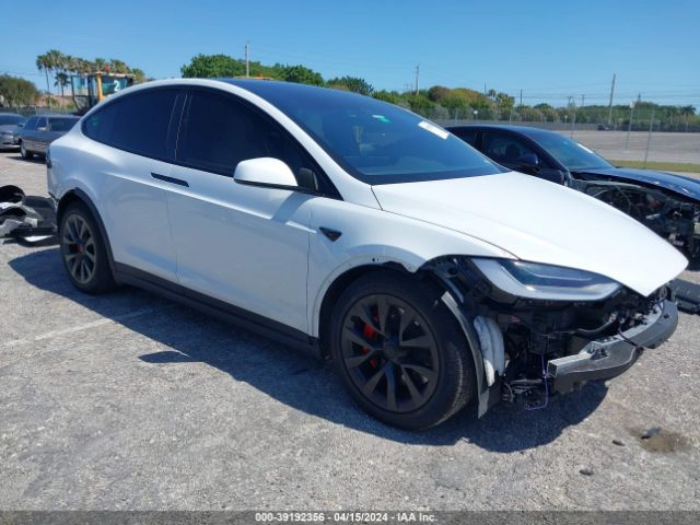 2023 Tesla Model X Plaid Tri Motor All-wheel Drive მანქანა იყიდება აუქციონზე, vin: 7SAXCBE63PF404410, აუქციონის ნომერი: 39192356