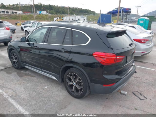 2016 BMW X1 WBXHT3C32G5E51550 Photo 2