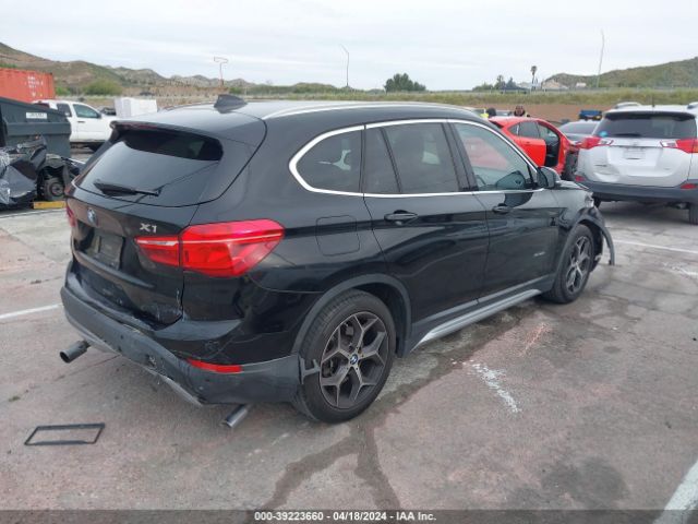 2016 BMW X1 WBXHT3C32G5E51550 Photo 3