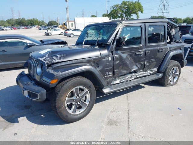 1C4HJXEN4JW290092 Jeep Wrangler Unlimited Sahara 4x4