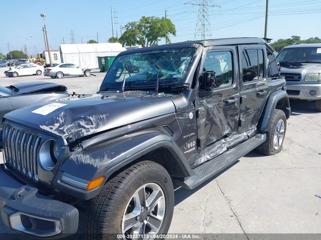 1C4HJXEN4JW290092 Jeep Wrangler Unlimited Sahara 4x4
