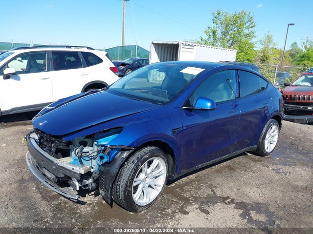 2023 TESLA MODEL Y 7SAYGAEE2PF667255 Photo 1