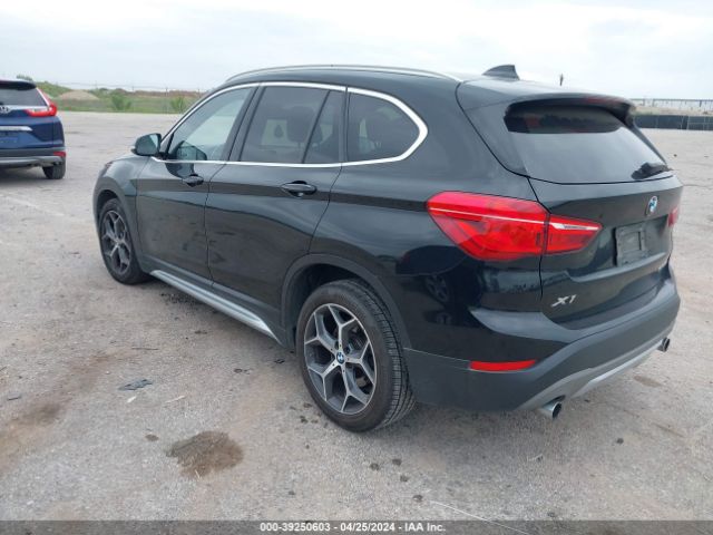 2018 BMW X1 WBXHU7C31J5L07822 Photo 2
