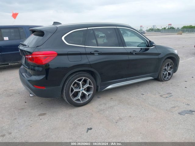 2018 BMW X1 WBXHU7C31J5L07822 Photo 3