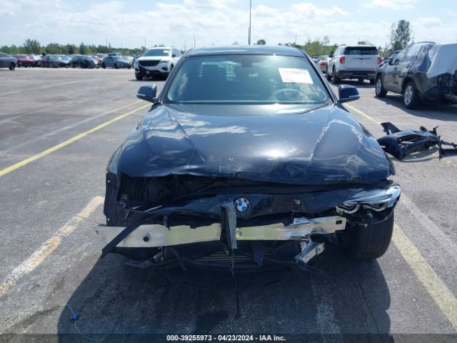 WBA8A9C54JAD28058 BMW 320i