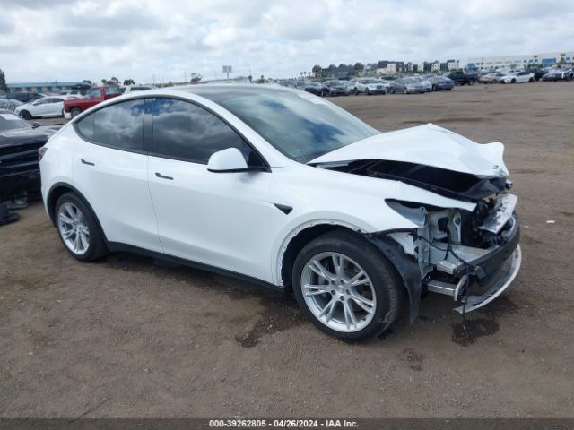 2021 Tesla Model Y Standard Range Rear-wheel Drive მანქანა იყიდება აუქციონზე, vin: 5YJYGDED0MF163143, აუქციონის ნომერი: 39262805