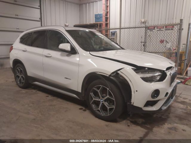 2017 BMW X1 WBXHT3C31H5F76458