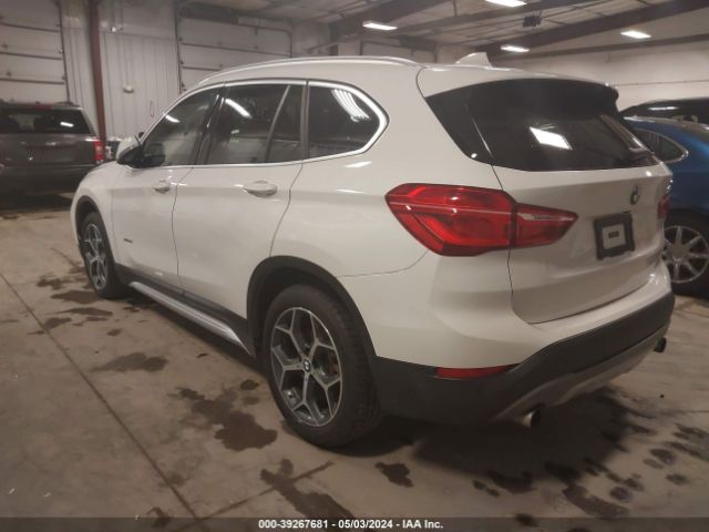 2017 BMW X1 WBXHT3C31H5F76458 Photo 2