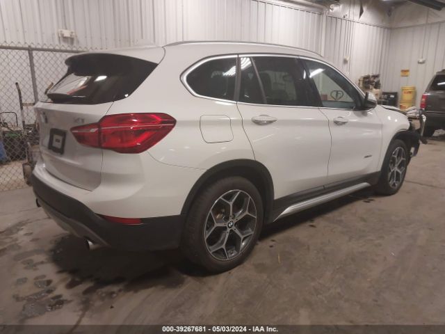 2017 BMW X1 WBXHT3C31H5F76458 Photo 3