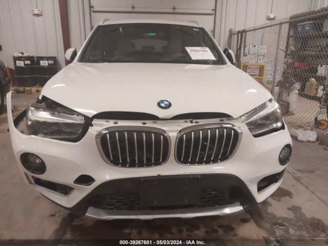 2017 BMW X1 WBXHT3C31H5F76458 Photo 5