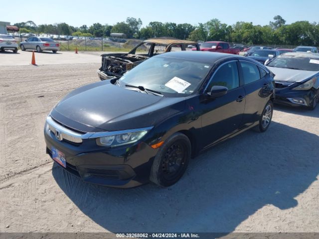 2HGFC2F51GH509733 Honda Civic Lx