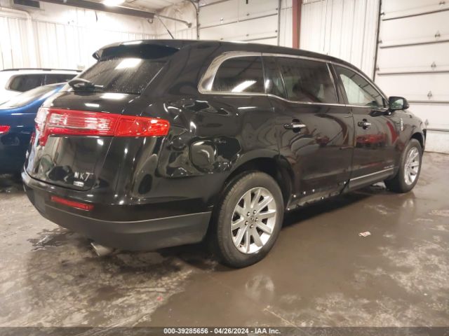 2LMHJ5NK4KBL02092 Lincoln Mkt Livery