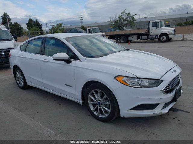 Auction sale of the 2017 Ford Fusion Hybrid Se, vin: 3FA6P0LU8HR386852, lot number: 39289049