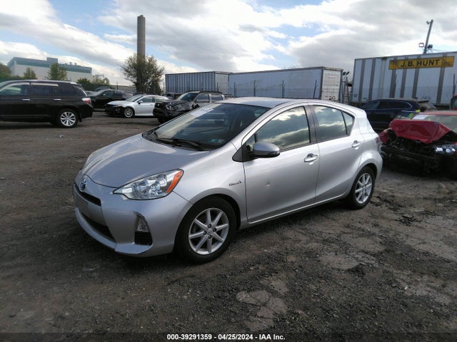 Toyota Prius C Three 2014 JTDKDTB38E1570111 Image 2