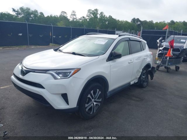 JTMZFREV0JJ742117 Toyota RAV4 LE