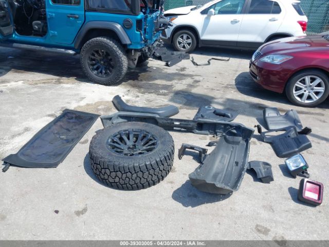 1C4HJXDG9LW209996 Jeep Wrangler Unlimited Black And Tan 4x4