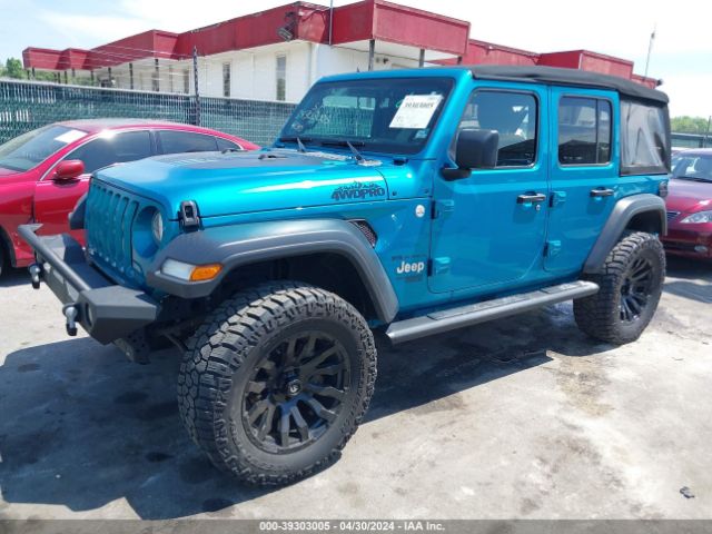 1C4HJXDG9LW209996 Jeep Wrangler Unlimited Black And Tan 4x4