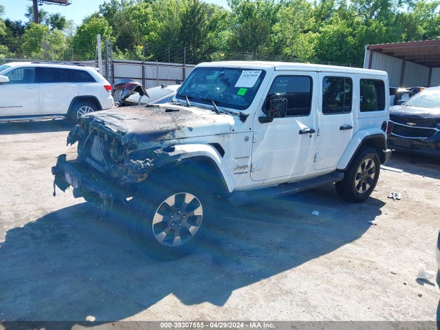 1C4HJXEG9JW106007 Jeep Wrangler Unlimited Sahara 4x4