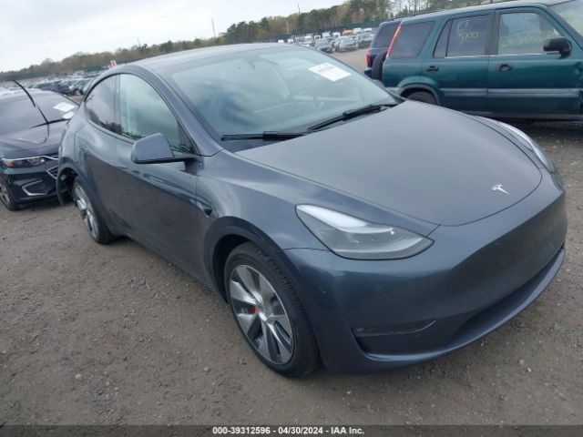 Продажа на аукционе авто 2023 Tesla Model Y Awd/long Range Dual Motor All-wheel Drive, vin: 7SAYGDEE6PF810029, номер лота: 39312596
