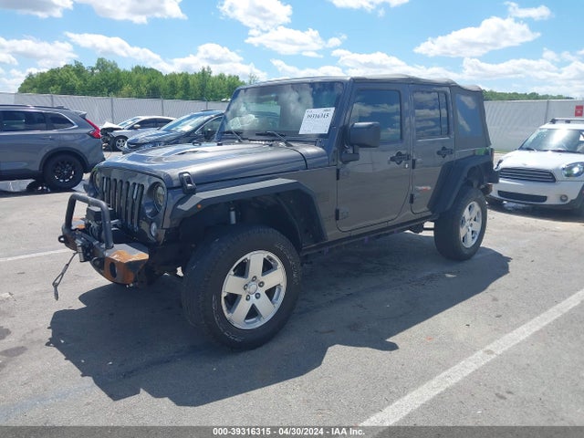 1C4BJWDG8EL298898 Jeep Wrangler Unlimited Sport