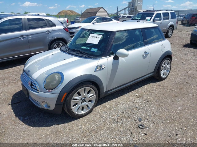 2010 MINI COOPER WMWMF3C53ATU77611 Photo 1