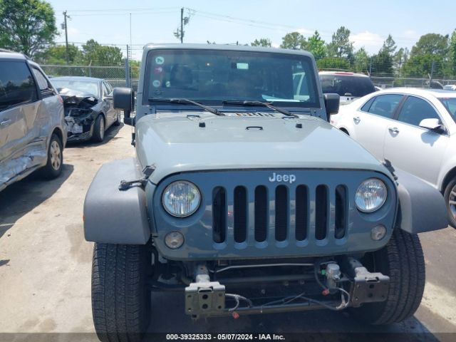 1C4BJWDG9FL609546 Jeep Wrangler Unlimited Sport