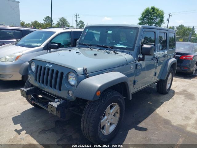 1C4BJWDG9FL609546 Jeep Wrangler Unlimited Sport
