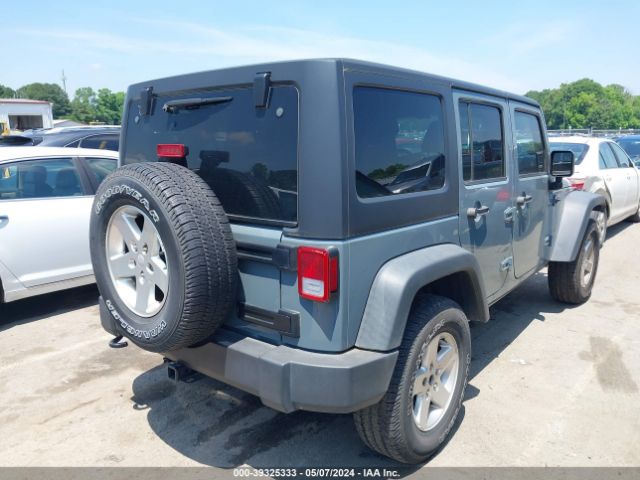 1C4BJWDG9FL609546 Jeep Wrangler Unlimited Sport