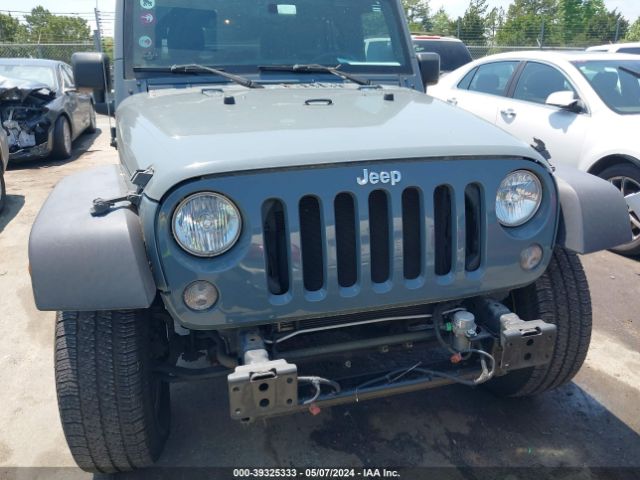 1C4BJWDG9FL609546 Jeep Wrangler Unlimited Sport