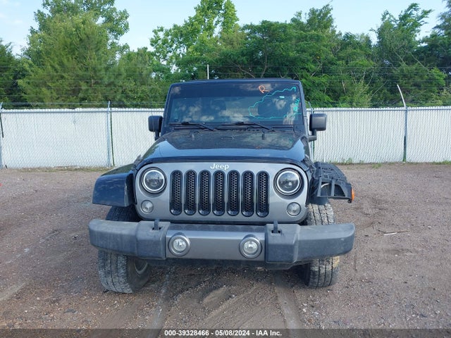 1C4BJWDG9EL234689 Jeep Wrangler Unlimited Freedom Edition