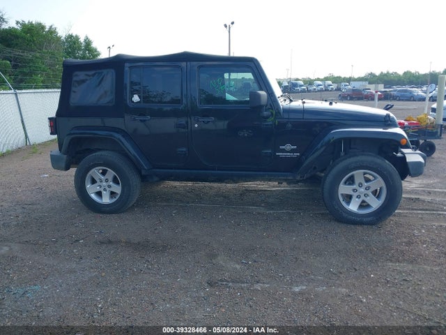 1C4BJWDG9EL234689 Jeep Wrangler Unlimited Freedom Edition