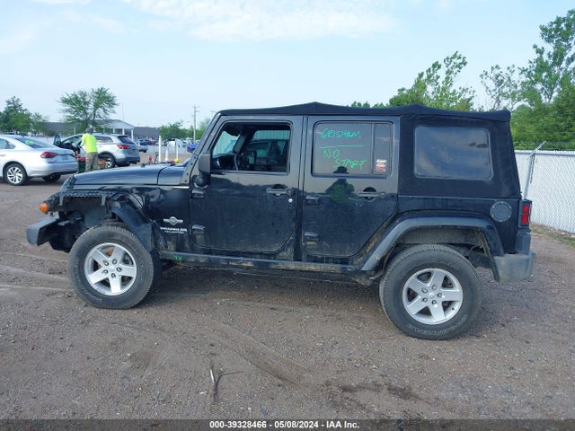 1C4BJWDG9EL234689 Jeep Wrangler Unlimited Freedom Edition
