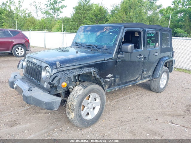 1C4BJWDG9EL234689 Jeep Wrangler Unlimited Freedom Edition