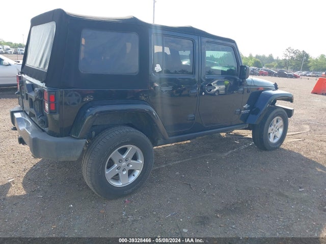 1C4BJWDG9EL234689 Jeep Wrangler Unlimited Freedom Edition