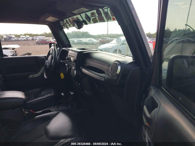 1C4BJWDG9EL234689 Jeep Wrangler Unlimited Freedom Edition