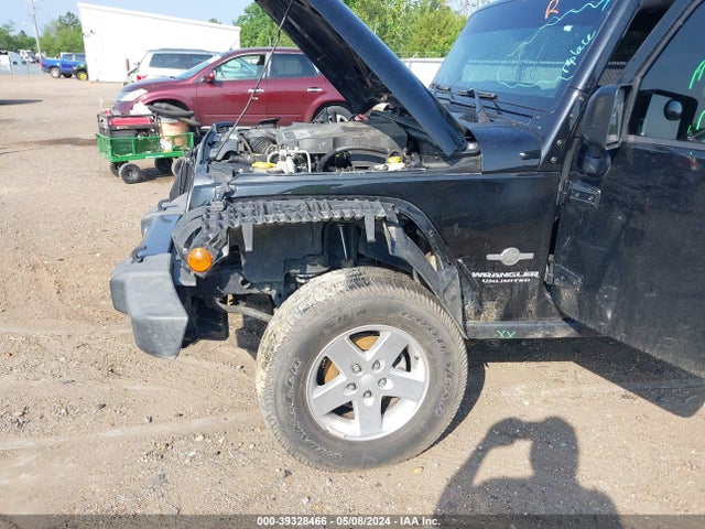 1C4BJWDG9EL234689 Jeep Wrangler Unlimited Freedom Edition