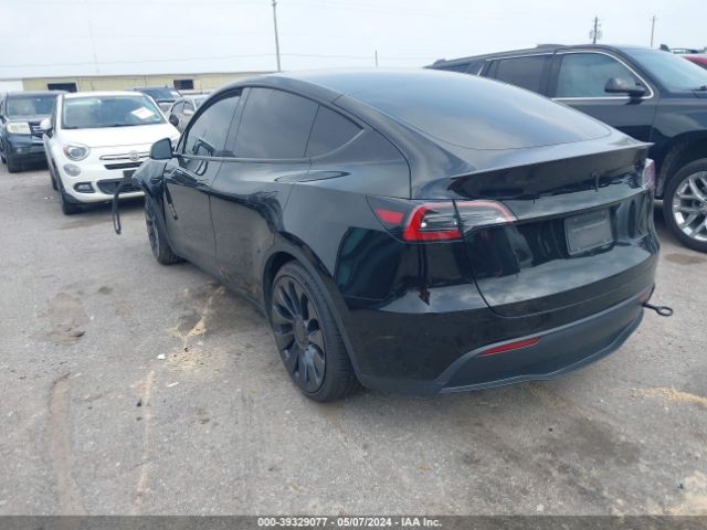 2023 TESLA MODEL Y 7SAYGDEF4PF744685 Photo 2