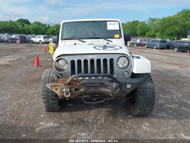 1C4HJWDG5EL196601 Jeep Wrangler Unlimited Freedom Edition