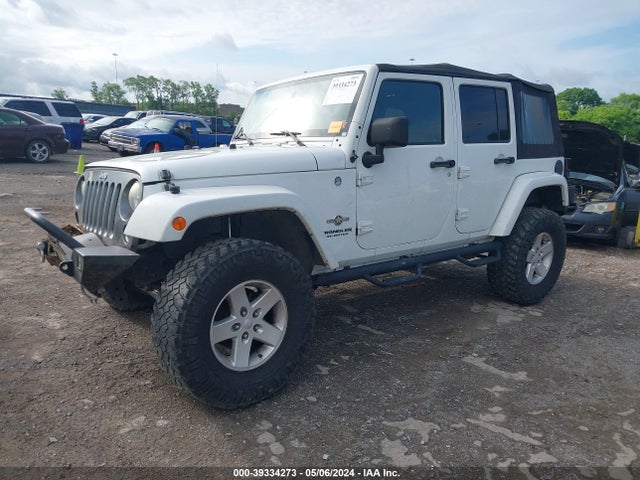 1C4HJWDG5EL196601 Jeep Wrangler Unlimited Freedom Edition