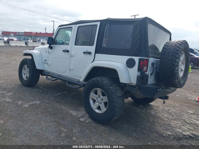 1C4HJWDG5EL196601 Jeep Wrangler Unlimited Freedom Edition
