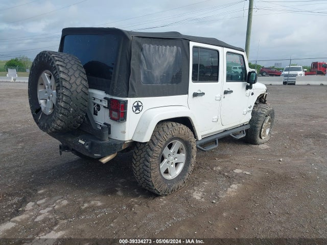 1C4HJWDG5EL196601 Jeep Wrangler Unlimited Freedom Edition