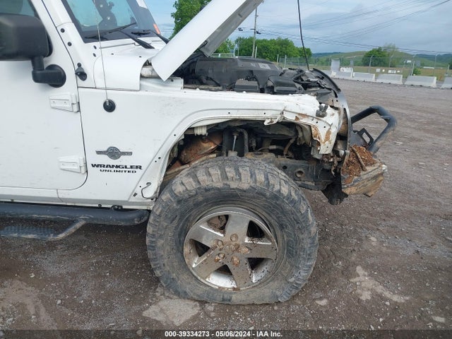 1C4HJWDG5EL196601 Jeep Wrangler Unlimited Freedom Edition